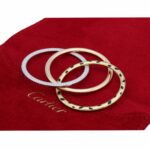 Cartier Trinity Panthère Anhänger Gold mit Cartier Schmuckbeutel Vorschau