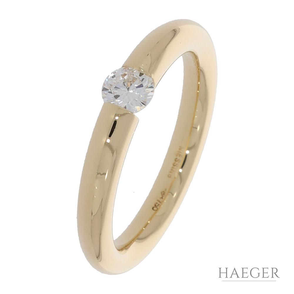 Zeitloser Diamant Spannring aus dem Hause Niessing in edlem 750er Gelbgold gefertigt.