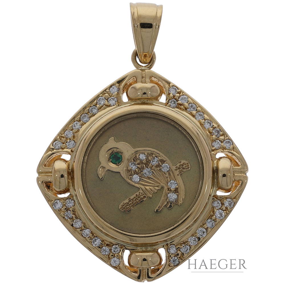 Anhaenger mit Drehelement Gelbgold 18 Karat mit Diamanten und Smaragd