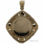 Anhaenger mit Drehelement Gelbgold 18 Karat mit Diamanten und Smaragd Vorschau