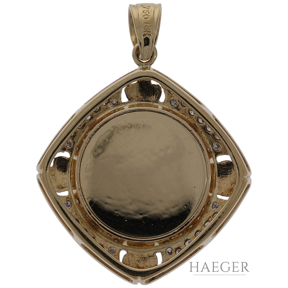 Anhaenger mit Drehelement Gelbgold 18 Karat mit Diamanten und Smaragd