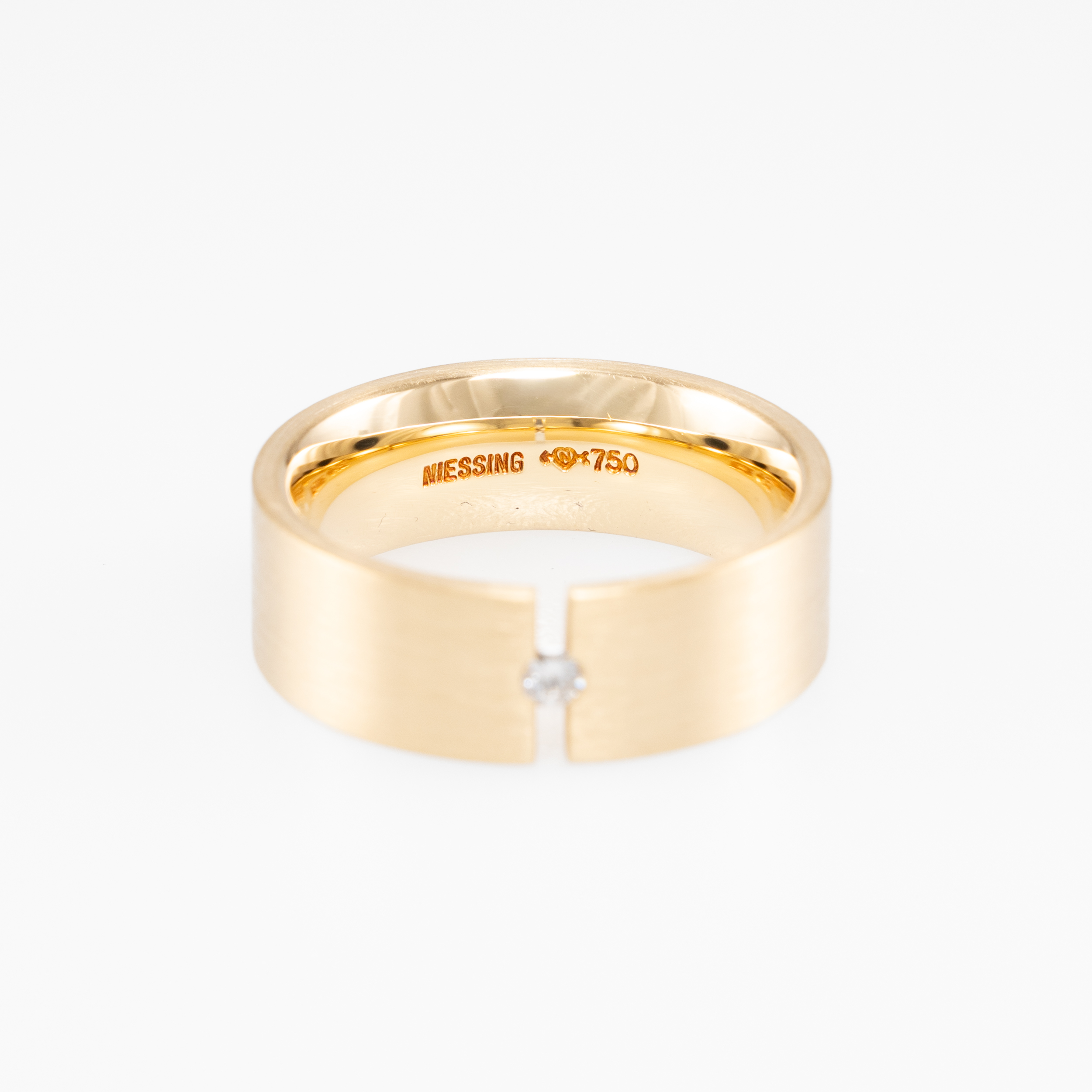 Niessing Spannring mit Diamant Gr. 53 Gelbgold